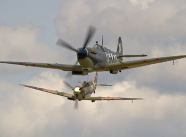 Supermarine Spitfire Mk Vb BM597 JH-C (G-MKVB) closes in on Asian Supermarine Spitfire Mk LF III PP972 (G-BUAR)